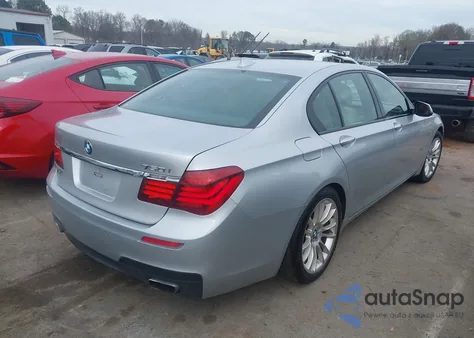 2015 BMW 750I из США, поврежденный, VIN WBAYA8C59FD825443